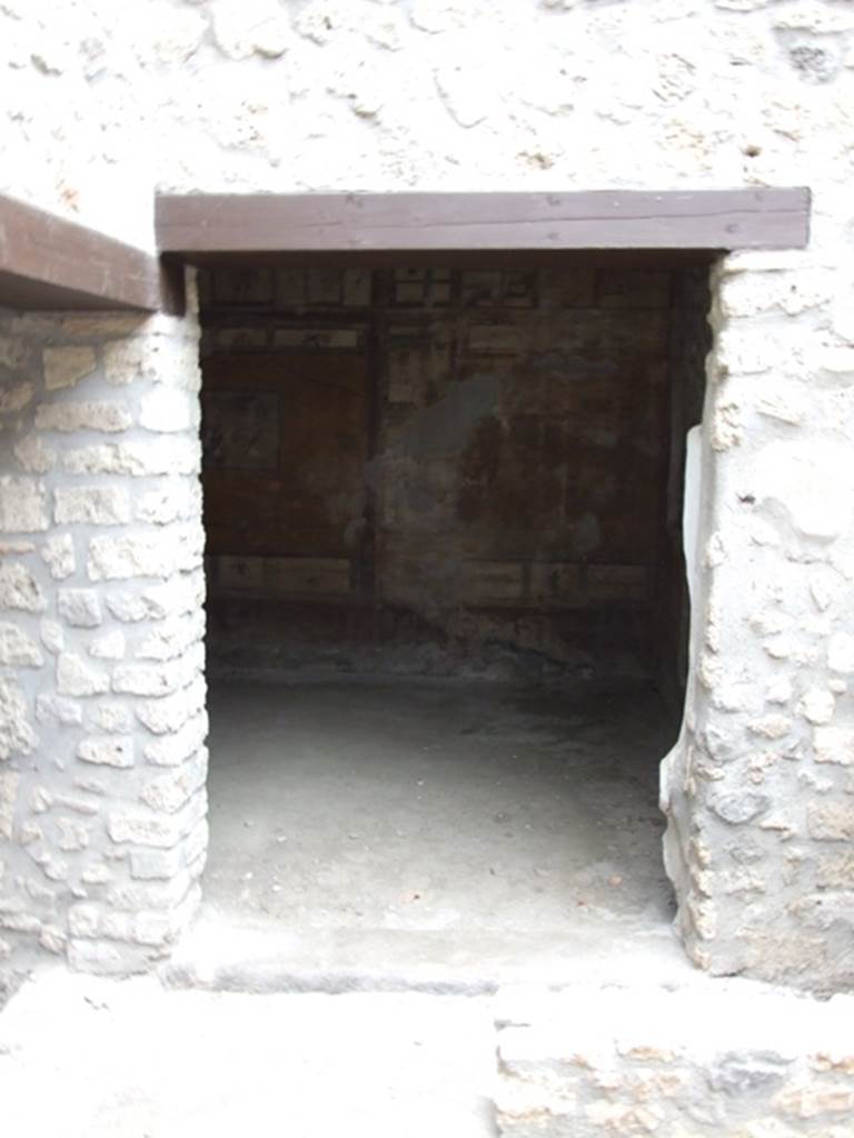 I.11.6 Pompeii. March 2009. Doorway to room 7, triclinium.  Doorway on east side of garden area.