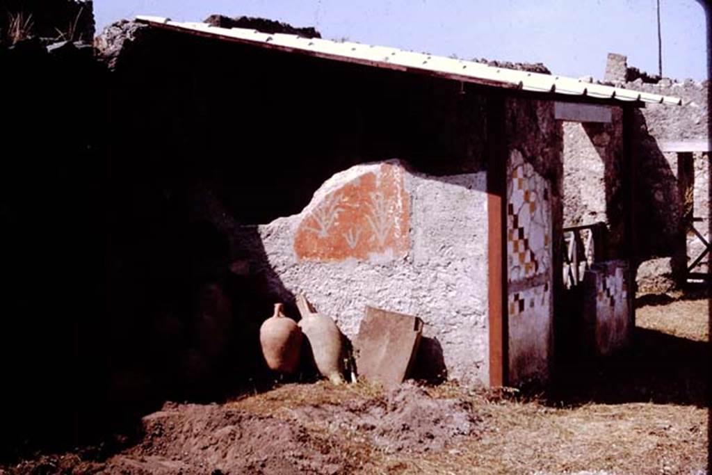 I.11.10 Pompeii. 1964. Looking towards small room against south wall of garden area.   Photo by Stanley A. Jashemski.
Source: The Wilhelmina and Stanley A. Jashemski archive in the University of Maryland Library, Special Collections (See collection page) and made available under the Creative Commons Attribution-Non Commercial License v.4. See Licence and use details.
J64f1565