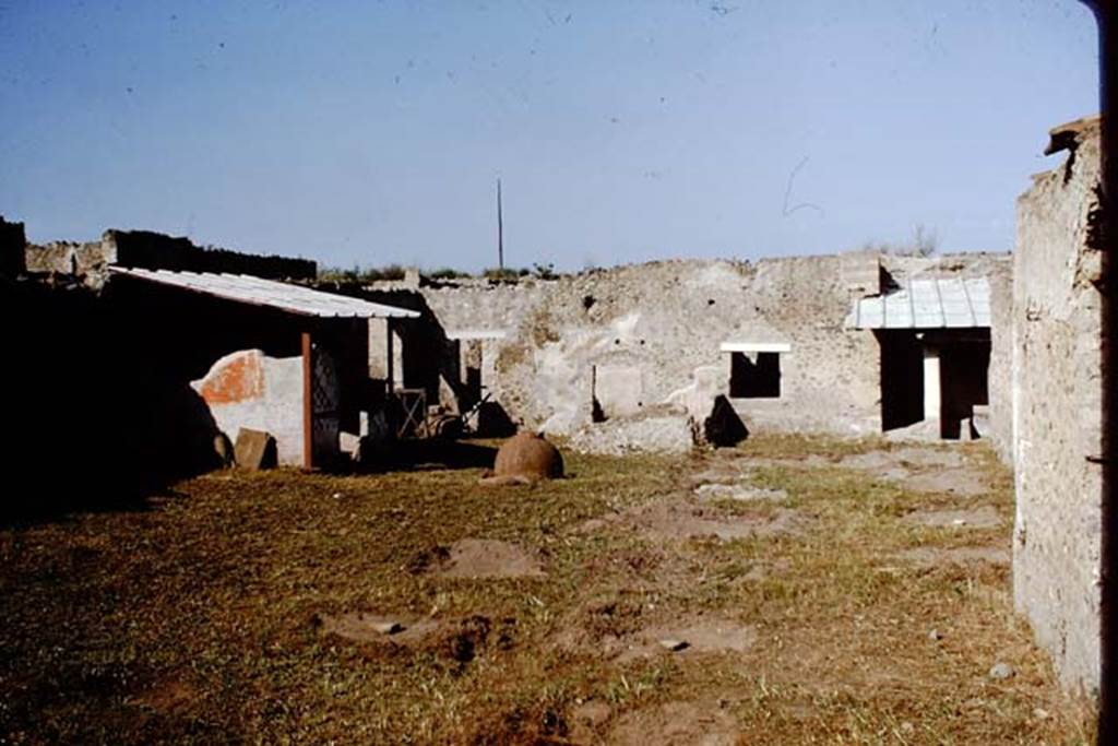 I.11.10 Pompeii. 1964. Looking towards west side of garden area.  Photo by Stanley A. Jashemski.
Source: The Wilhelmina and Stanley A. Jashemski archive in the University of Maryland Library, Special Collections (See collection page) and made available under the Creative Commons Attribution-Non Commercial License v.4. See Licence and use details.
J64f1521