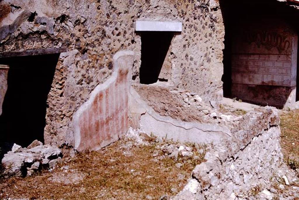 I.11.10 Pompeii. 1964. Looking north-west from garden area, across a small enclosure with a low wall. According to Wilhelmina, the inside of the low wall was painted to represent a fence with plants growing behind it. Photo by Stanley A. Jashemski.
Source: The Wilhelmina and Stanley A. Jashemski archive in the University of Maryland Library, Special Collections (See collection page) and made available under the Creative Commons Attribution-Non Commercial License v.4. See Licence and use details.
J64f1677
