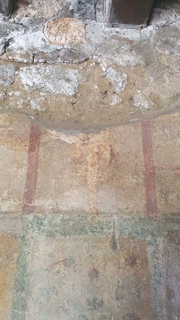 I.11.10 Pompeii. July 2021. 
Detail of painted decoration from upper west wall at north end. 
Foto Annette Haug, ERC Grant 681269 DÉCOR.