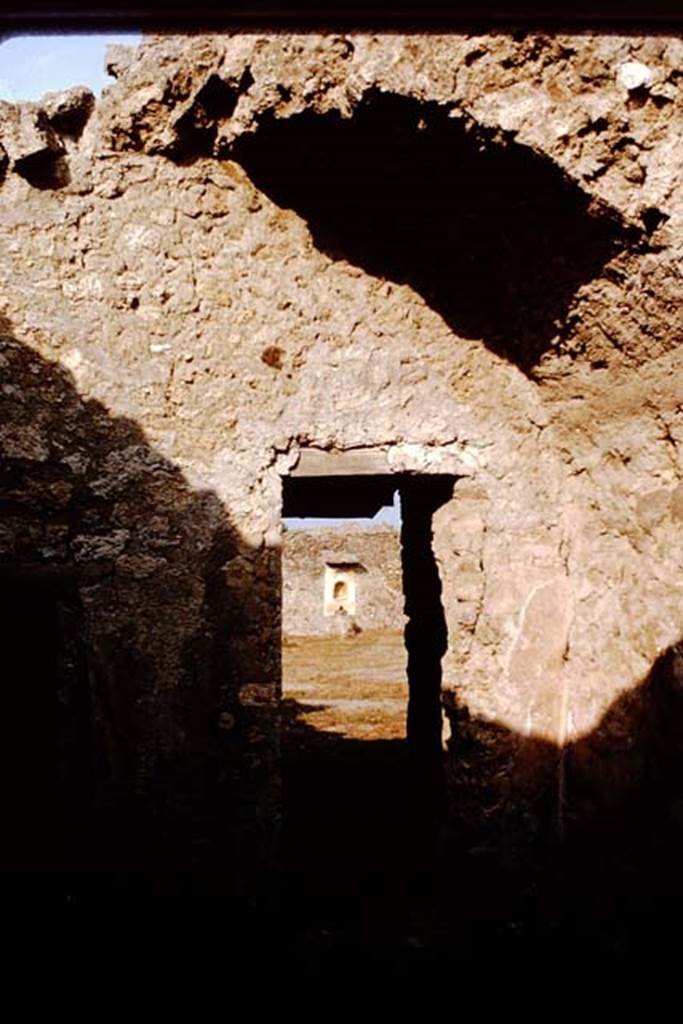 I.11.11 Pompeii. 1964. 
Looking east through doorway from linking room between I.11.10/11/12, leading to garden. 
Photo by Stanley A. Jashemski.
Source: The Wilhelmina and Stanley A. Jashemski archive in the University of Maryland Library, Special Collections (See collection page) and made available under the Creative Commons Attribution-Non-Commercial License v.4. See Licence and use details.
J64f1969