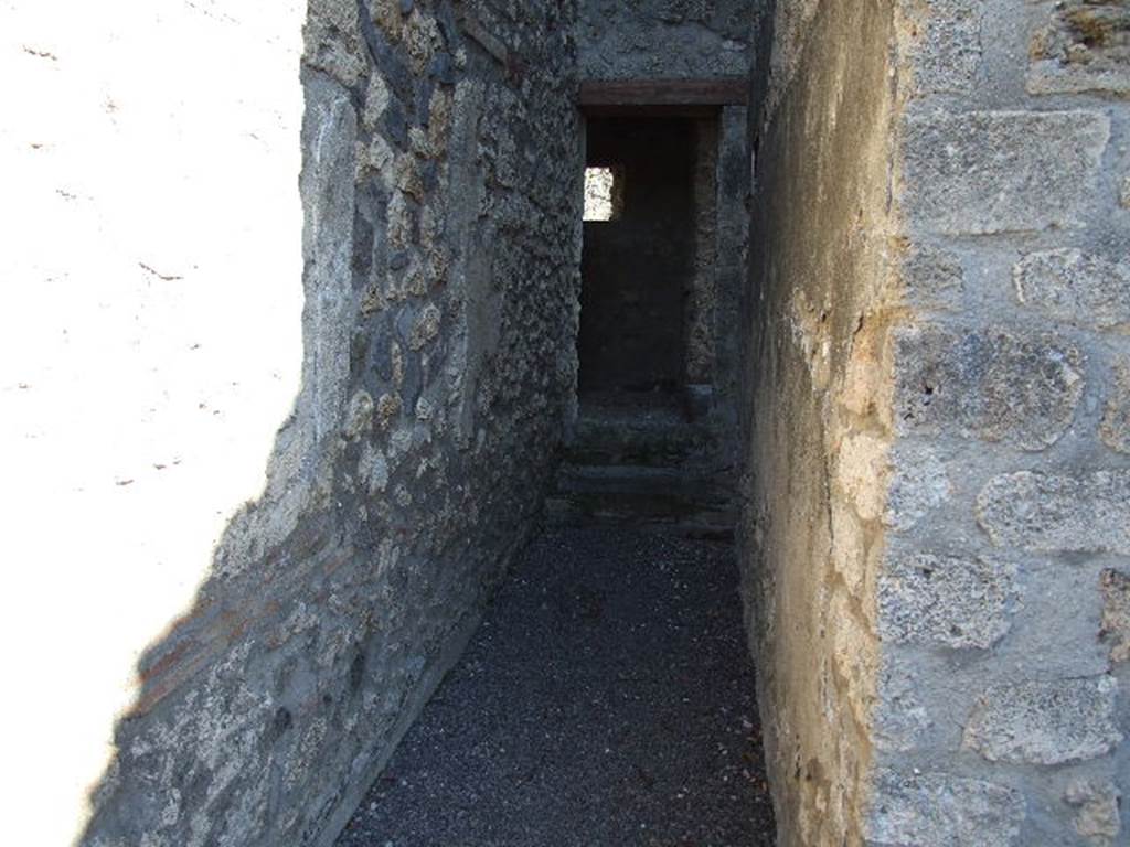 I.11.14 Pompeii. December 2006. Looking east along corridor to kitchen, and garden area.