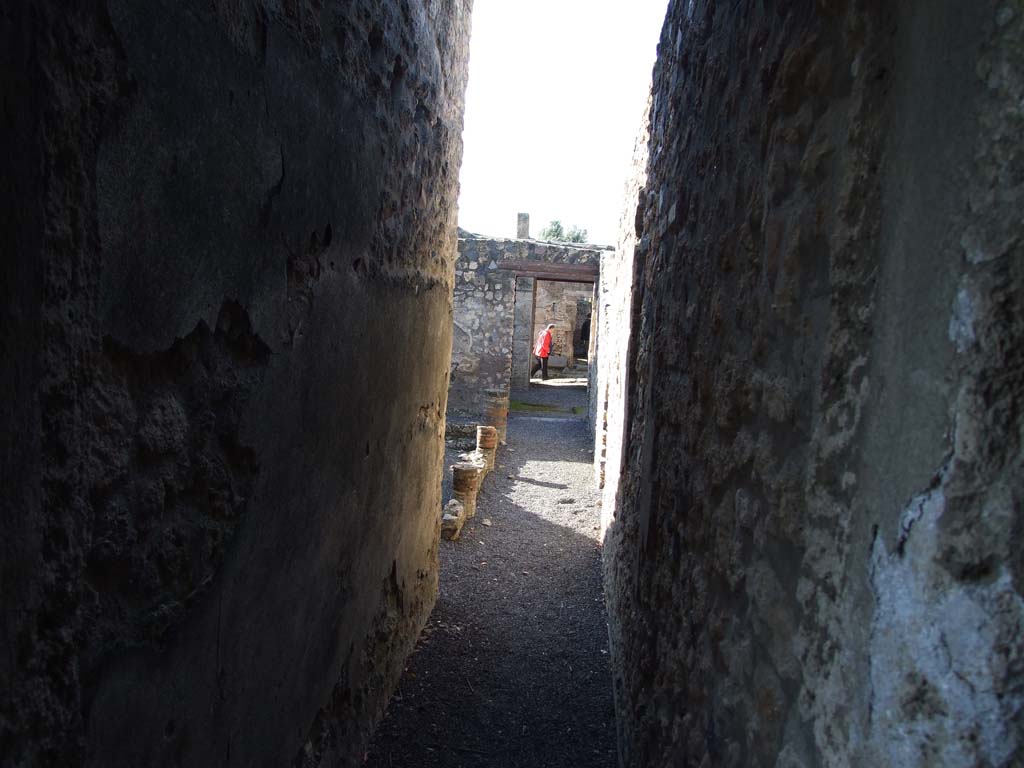 I.11.14 Pompeii. December 2006. Looking west along corridor to peristyle area and front of house.