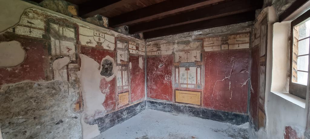 I.11.15 Pompeii. January 2023. 
Room 9, looking through doorway into room on west side of garden. Photo courtesy of Miriam Colomer.