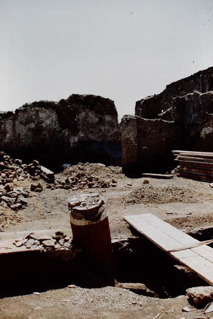 I.12.2 and I.12.1 Pompeii. 1961.  Room 8, portico.  Looking south across portico to garden area, shortly after excavation. Photo by Stanley A. Jashemski.
Source: The Wilhelmina and Stanley A. Jashemski archive in the University of Maryland Library, Special Collections (See collection page) and made available under the Creative Commons Attribution-Non Commercial License v.4. See Licence and use details.
J61f0243