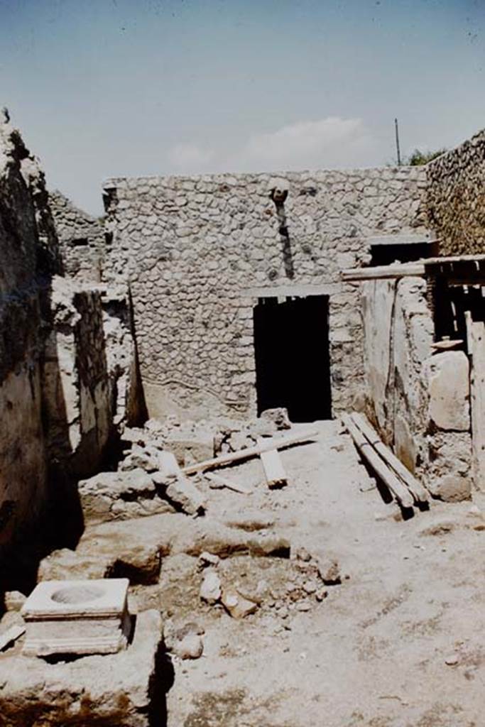 I.12.2 and I.12.1 Pompeii. 1961. Looking north from room 11 into room 17, and its north wall with doorway to room 3. On the right behind the pilaster is a doorway from the corridor.
Photo by Stanley A. Jashemski.
Source: The Wilhelmina and Stanley A. Jashemski archive in the University of Maryland Library, Special Collections (See collection page) and made available under the Creative Commons Attribution-Non Commercial License v.4. See Licence and use details.
J61f0249