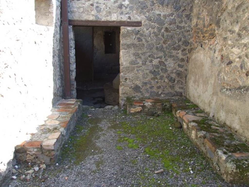 I.12.2 and I.12.1 Pompeii.  March 2009.  Room 1, looking east to bakery in room 3.