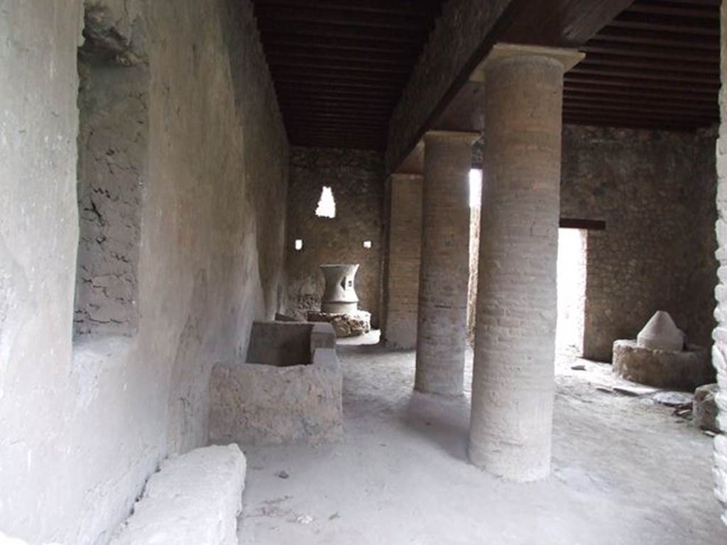 I.12.1 and I.12.2 Pompeii.  December 2006.   Room with mills.