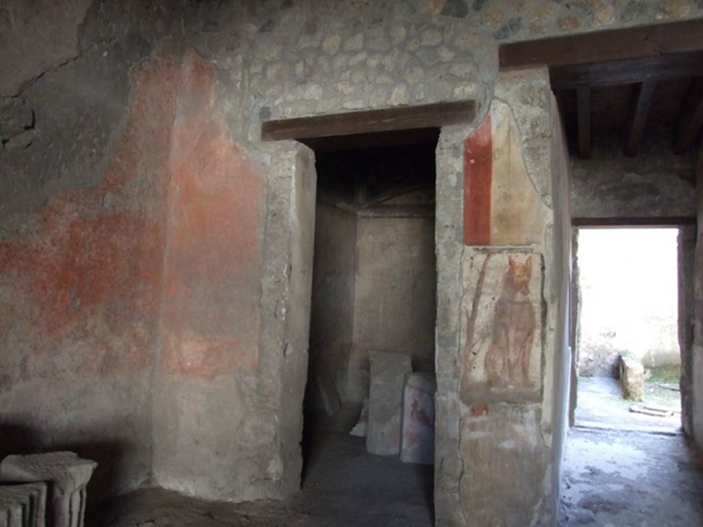 I.12.3 Pompeii. March 2009. Room 1, south-east corner of courtyard.  
Doorway to room 2, and corridor to rear.