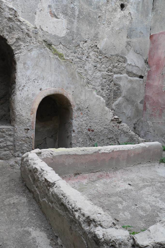 I.12.5 Pompeii. December 2018. Looking east across basin/tub towards masonry stairs. Photo courtesy of Aude Durand.