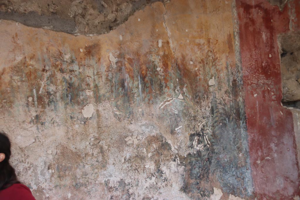 I.12.8 Pompeii. October 2022. 
Peristyle 9, east side of north wall with detail of remaining garden painting. Photo courtesy of Klaus Heese.