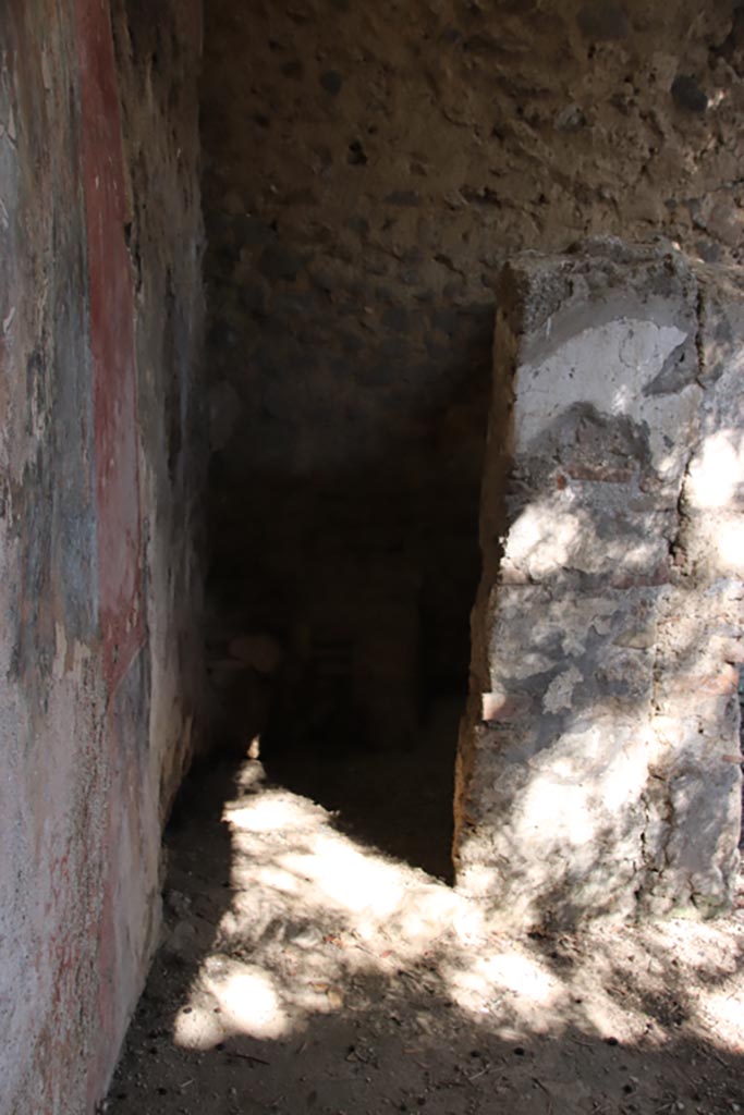 I.12.8 Pompeii. October 2022. 
Doorway into room 12, latrine, in north-east corner of peristyle 9. Photo courtesy of Klaus Heese.