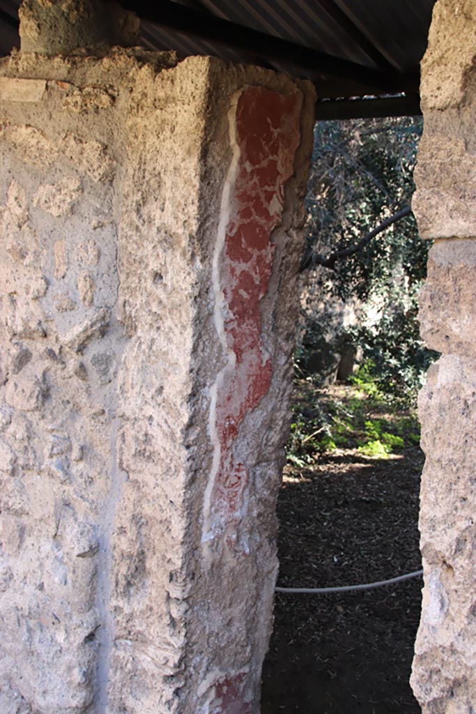 I.12.8 Pompeii. October 2022. 
Room 13, doorway in south wall into peristyle 9. Photo courtesy of Klaus Heese.