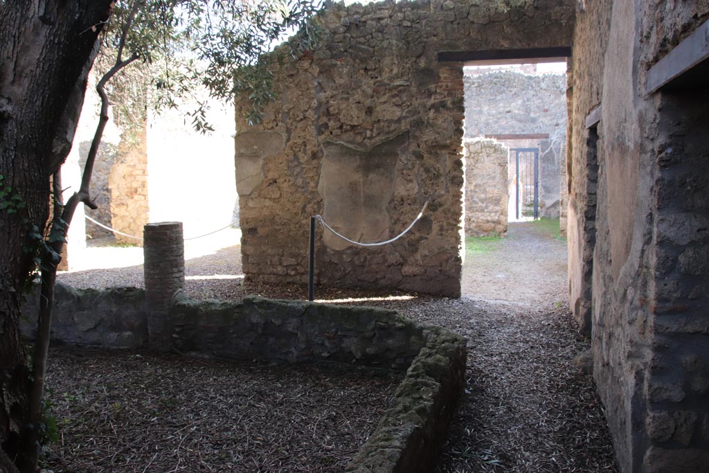 I.12.8 Pompeii. October 2022. 
Peristyle 9, looking south along west side towards doorway to 5, on right, and into room 7 on south portico, on left.
Photo courtesy of Klaus Heese.
Photo courtesy of Klaus Heese.