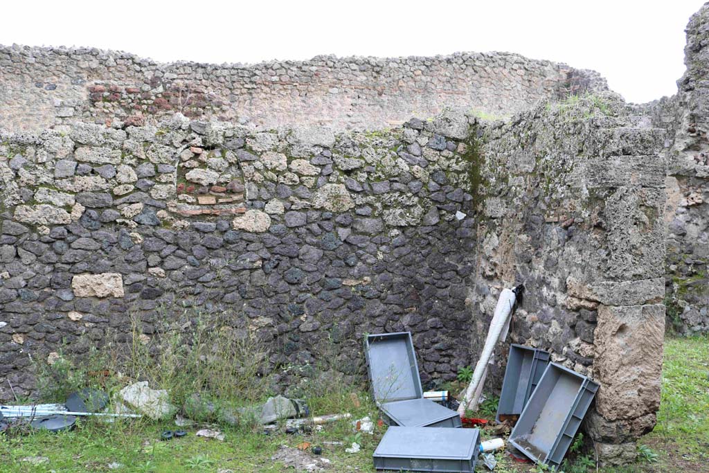 I.12.8 Pompeii. December 2018. 
Room 5, east wall with bricked-in niche, and south-east corner with doorway to room 1. Photo courtesy of Aude Durand.
