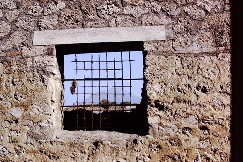 I.12.8 Pompeii. 1972. Window with grating. Photo by Stanley A. Jashemski. 
Source: The Wilhelmina and Stanley A. Jashemski archive in the University of Maryland Library, Special Collections (See collection page) and made available under the Creative Commons Attribution-Non Commercial License v.4. See Licence and use details. J72f0602