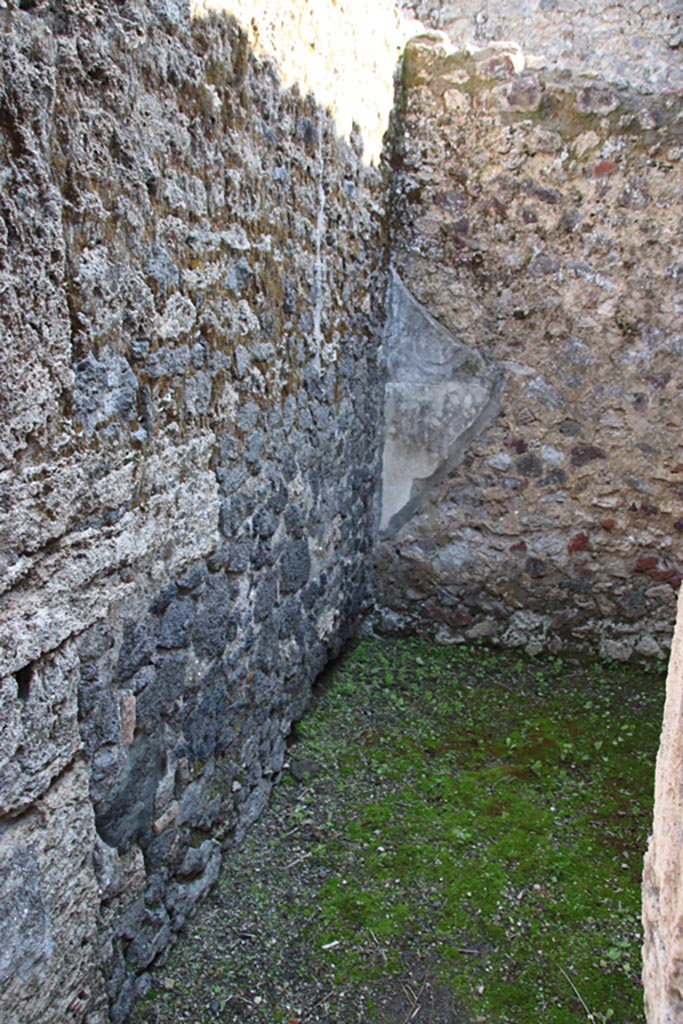 I.12.8Pompeii. October 2022. 
Room 3, looking south along east wall towards south-east corner. Photo courtesy of Klaus Heese.