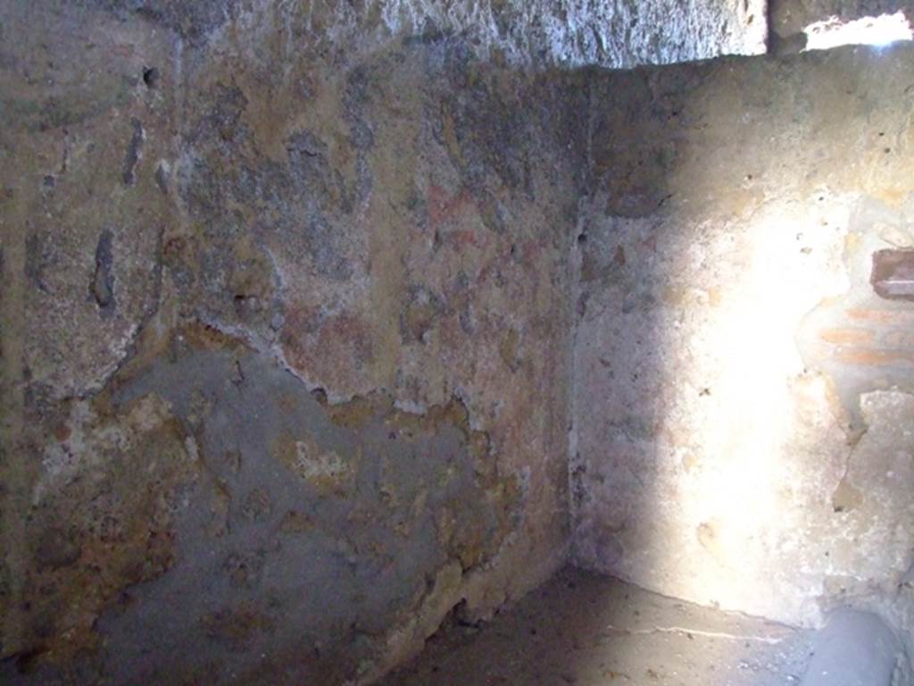 I.12.11 Pompeii. March 2009. Lararium painting in south-west corner, and west wall above hearth in kitchen.
