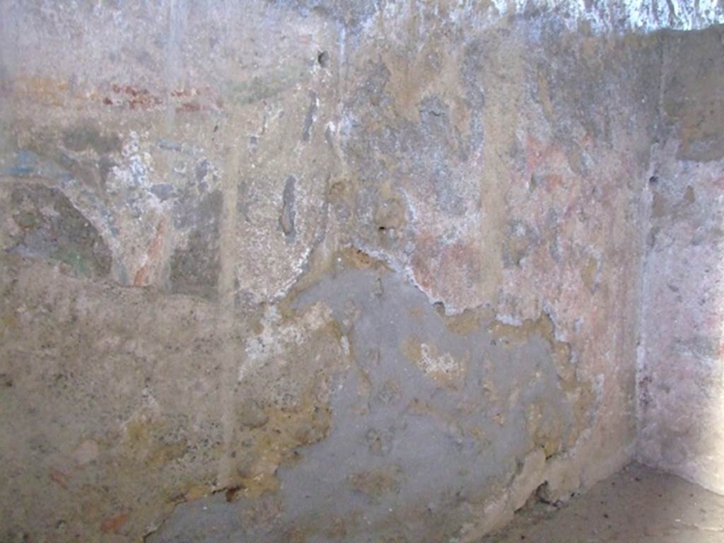 I.12.11 Pompeii. March 2009. Lararium painting with traces of garlands on south wall, looking towards the south-west corner.
