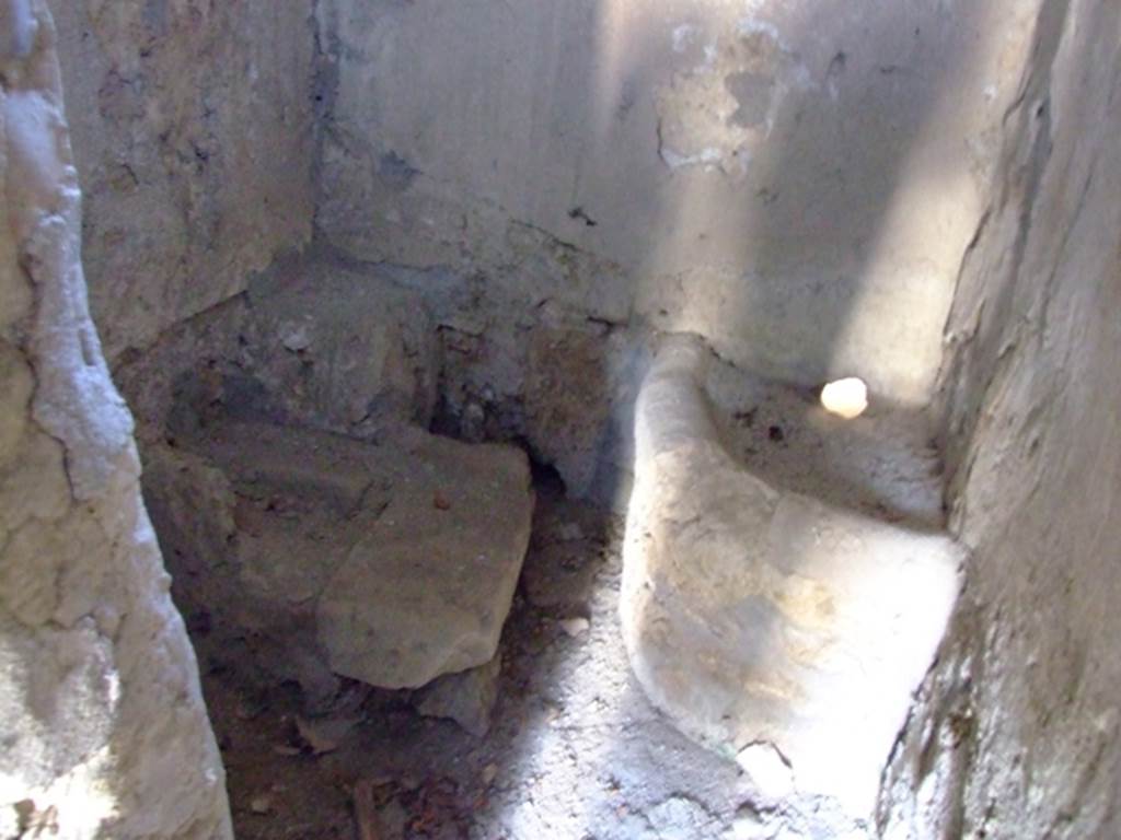 I.12.11 Pompeii. March 2009. Small room at west end of kitchen. According to Hobson, this is the latrine. See Hobson, B. 2009. Pompeii, Latrines and Down Pipes. Oxford, Hadrian Books, (p.102)