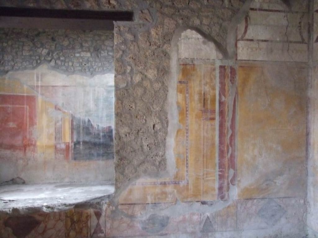 I.12.11 Pompeii. December 2007. South wall in south-west corner of oecus on the west side of the garden area.