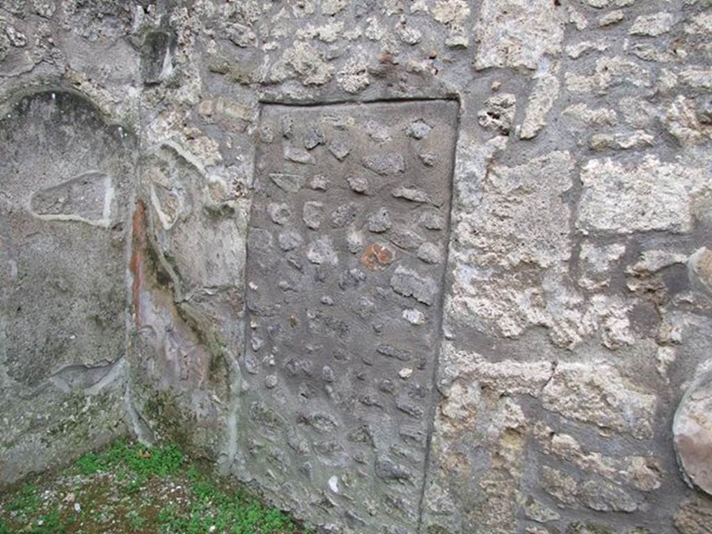 I.12.11.  Blocked door to I.12.12 in west wall of atrium.   December 2006.