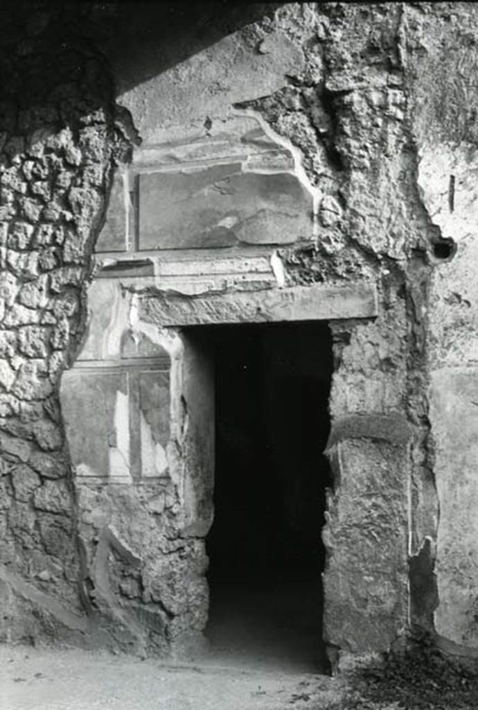 I.13.2 Pompeii. 1975. Domus of Sutoria Primigenia, left ala, right S wall, doorway. 
Photo courtesy of Anne Laidlaw.
American Academy in Rome, Photographic Archive. Laidlaw collection _P_75_6_11.