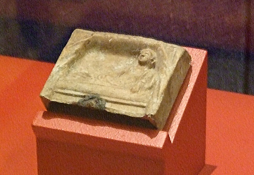 I.13.3 Pompeii. Terracotta relief of a reclining deity. SAP 11549. 
Photographed at “A Day in Pompeii” exhibition at Melbourne Museum. September 2009.
