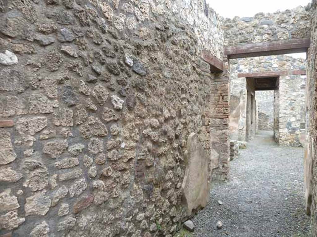 I.13.4 Pompeii. May 2010. Looking south along east wall of entrance corridor.