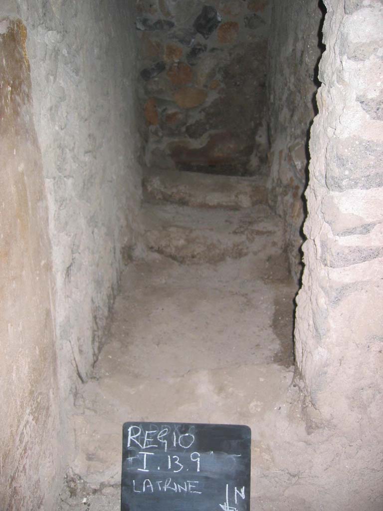 I.13.9 Pompeii. July 2008. 
Looking south into latrine, in south-east corner of atrium. Photo courtesy of Barry Hobson.