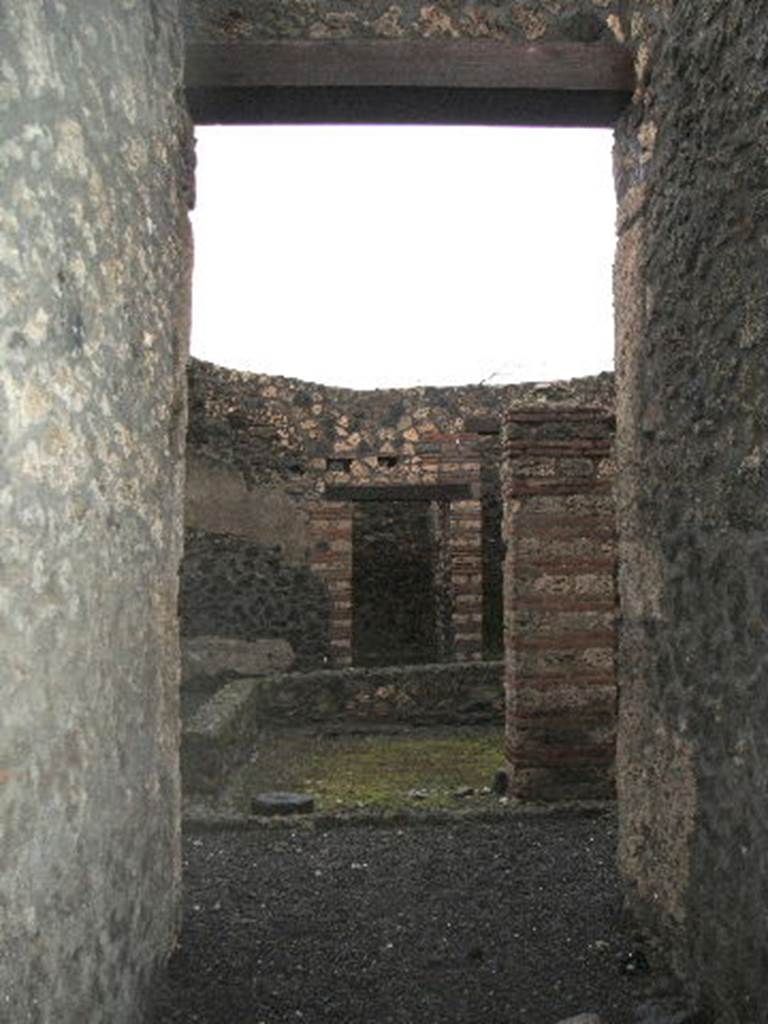 I.13.11 Pompeii. December 2004. Looking north from entrance across garden area.
This garden (xystus) took the place of the ancient atrium in this house, and was surrounded by a low wall on the west and north sides.