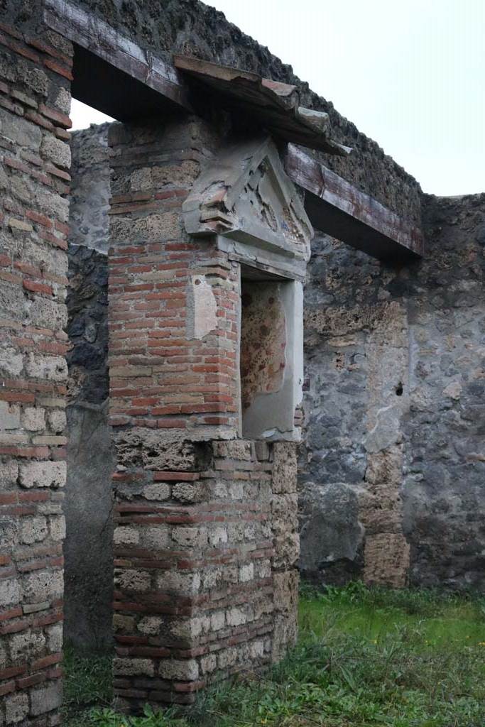 I.13.12 Pompeii. December 2018. 
West side of atrium, doorway to cubiculum, lararium and ala. Photo courtesy of Aude Durand.