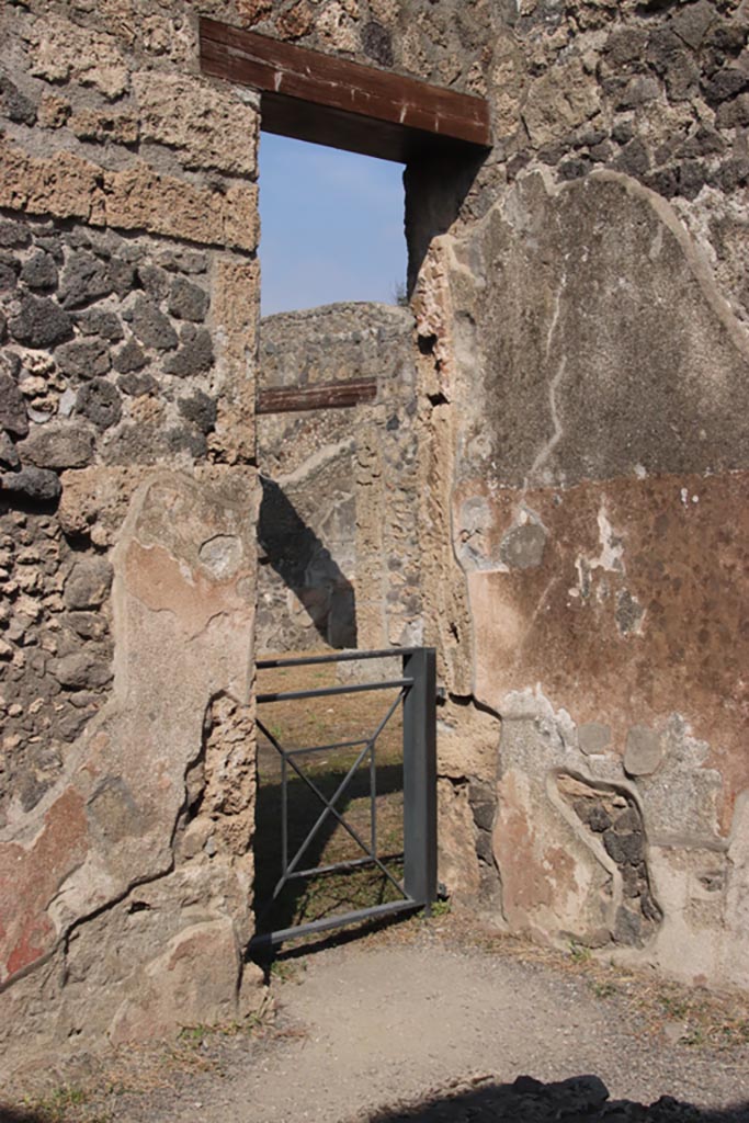 I.13.13 Pompeii. October 2023. 
Doorway in north-east corner into atrium of I.13.12. Photo courtesy of Klaus Heese.