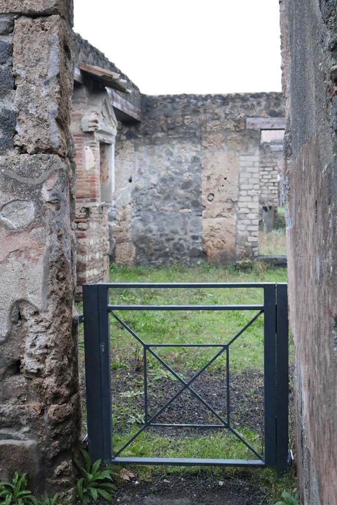 I.13.13 Pompeii. December 2018. 
Doorway in east end of north wall into atrium of I.13.12. Photo courtesy of Aude Durand.