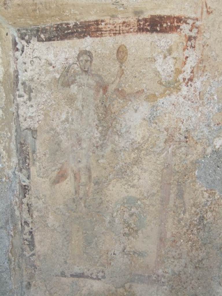 I.13.16 Pompeii.  March 2009. North wall.  Painting of Venus with mirror and remains of a statue of Priapus on a tall pedestal, on the right.