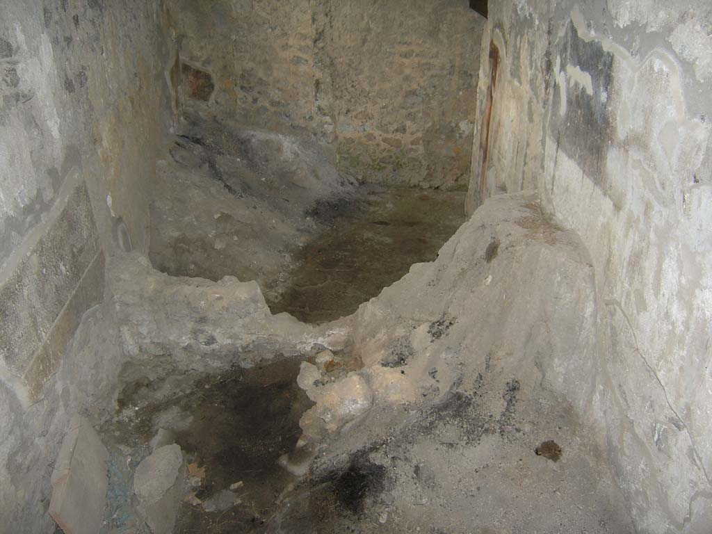 I.14.2 Pompeii. July 2008. Room I, cubiculum, looking south from room J. Photo courtesy of Guilhem Chapelin. 
At the far-left end is a mound of carbonized plants preserved in cubiculum I, south-east corner.
Voir Chapitre 2 : L’atelier de fabrication de nattes de la via di Nocera (I 14, 2) in Magali Cullin-Mingaud, 2010. La vannerie dans l'Antiquité romaine: Collection du Centre Jean Bérard 35. Paris. Centre Jean Berard, p. 129-171, fig. 196.
https://books.openedition.org/pcjb/706