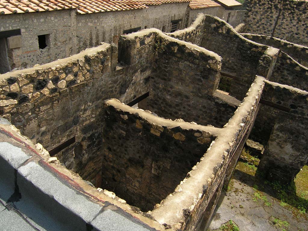 I.14.2 Pompeii. July 2008. Rooms on east side of atrium, looking south. Photo courtesy of Guilhem Chapelin.