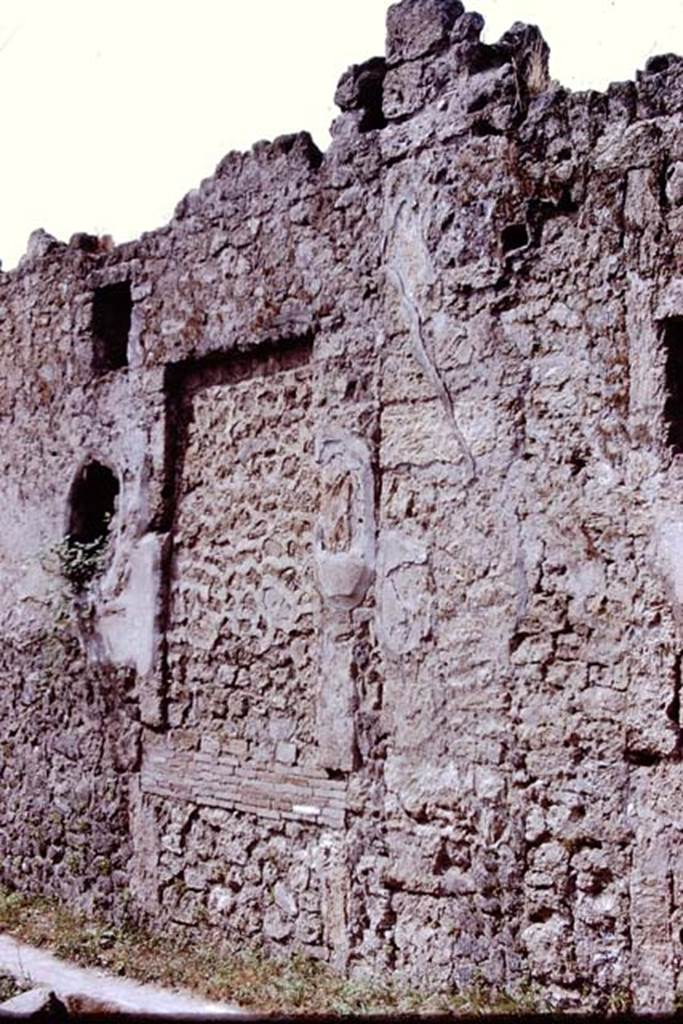 I.14.3 Pompeii. 1972. 
Detail of front facade on south side of entrance doorway on Via di Nocera.
Photo by Stanley A. Jashemski. 
Source: The Wilhelmina and Stanley A. Jashemski archive in the University of Maryland Library, Special Collections (See collection page) and made available under the Creative Commons Attribution-Non Commercial License v.4. See Licence and use details.
J72f0396