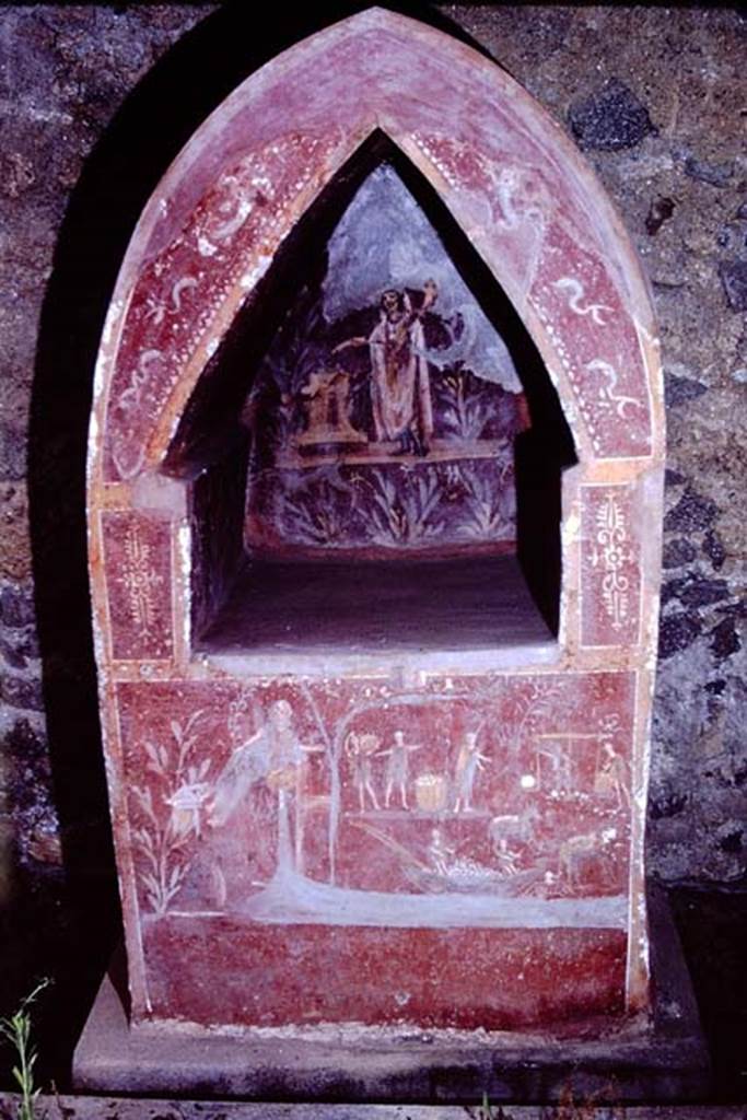 I.14.7 Pompeii. 1966. Lararium against south wall of garden area.  Photo by Stanley A. Jashemski.
Source: The Wilhelmina and Stanley A. Jashemski archive in the University of Maryland Library, Special Collections (See collection page) and made available under the Creative Commons Attribution-Non Commercial License v.4. See Licence and use details.
J66f0500
