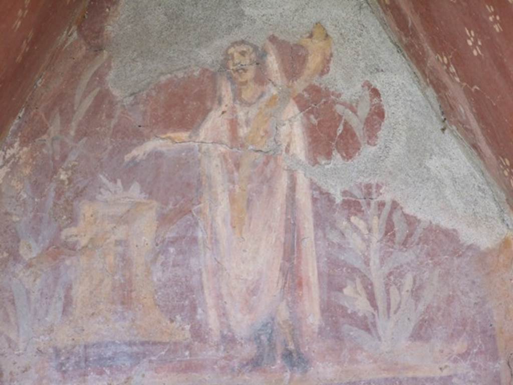 I.14.7 Pompeii. March 2009. Painting of Genius and altar amidst a painted garden.
See Fröhlich, T., 1991. Lararien und Fassadenbilder in den Vesuvstädten. Mainz: von Zabern, L33, p. 262-3, Taf.  6.