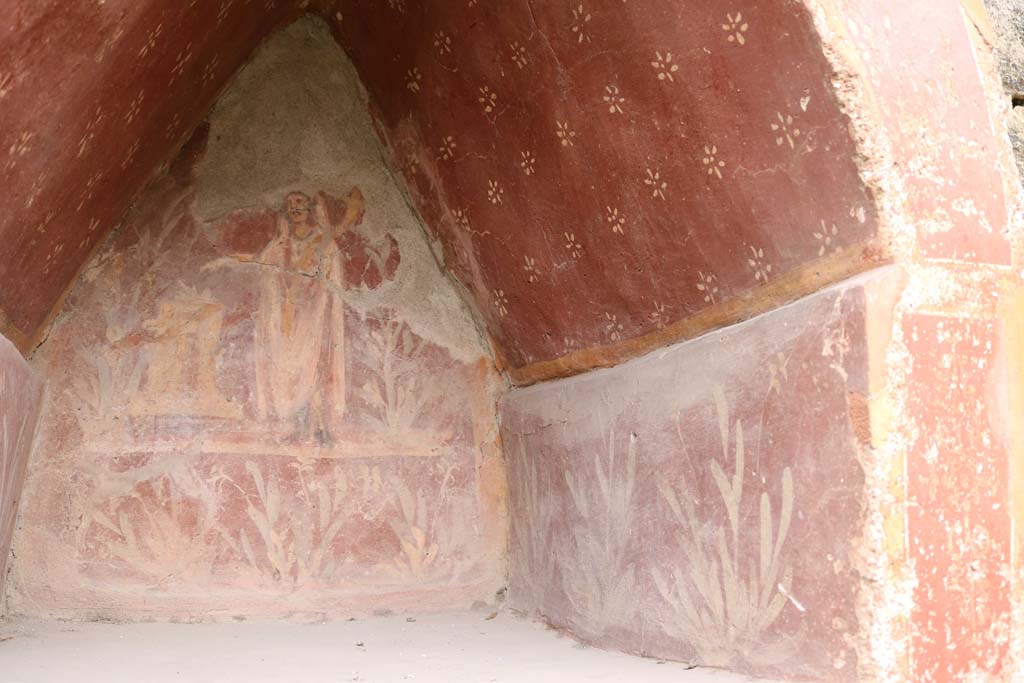 I.14.7 Pompeii. December 2018. 
Painted decoration on rear and west side of lararium niche in garden area. Photo courtesy of Aude Durand