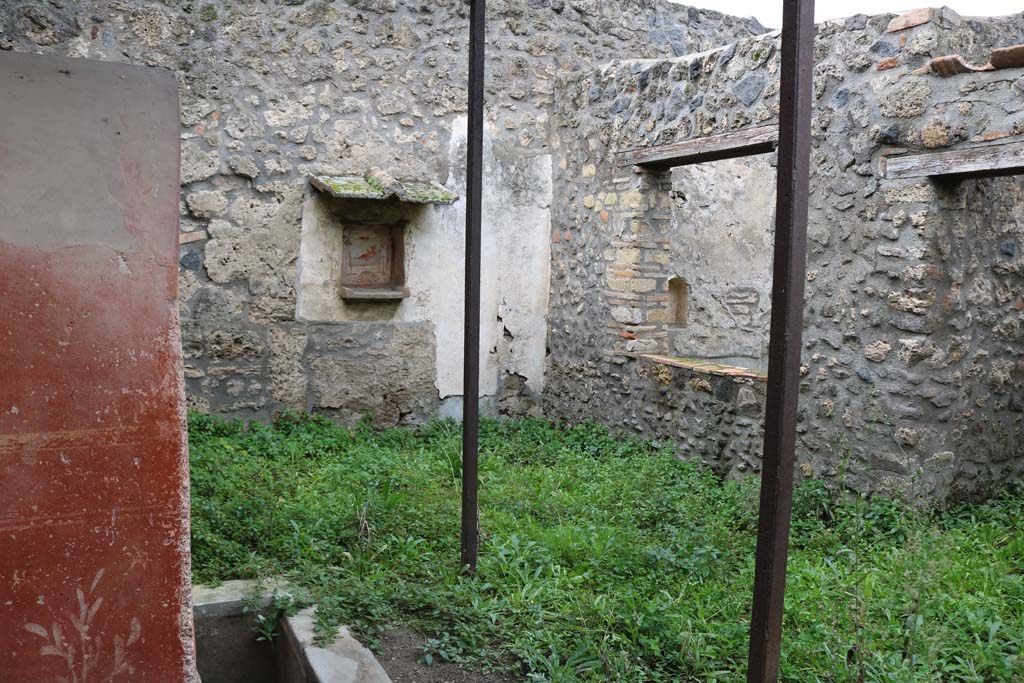 I.14.7 Pompeii. December 2018. 
Looking towards north-west corner of the garden area and window to triclinium. Photo courtesy of Aude Durand.