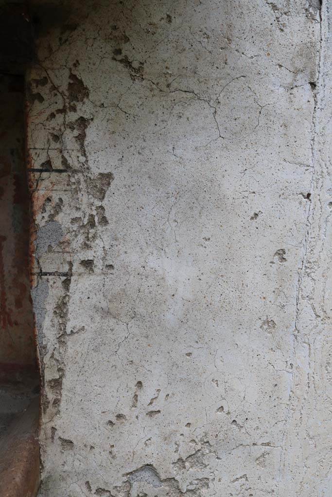 I.14.7 Pompeii. December 2018. 
West wall of the garden area, detail of the wall at its northern end. Photo courtesy of Aude Durand.