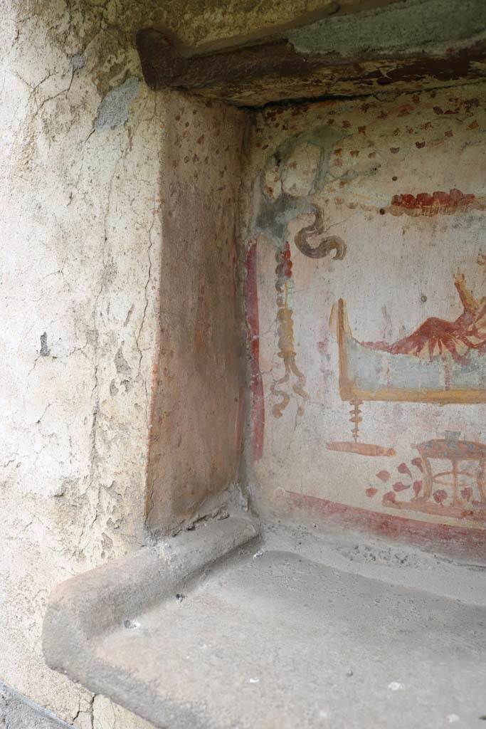 I.14.7 Pompeii. December 2018. 
South end of niche lararium on west wall. Photo courtesy of Aude Durand.