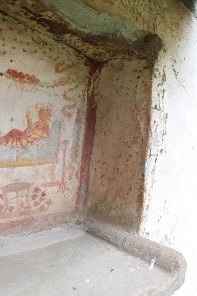 I.14.7 Pompeii. December 2018. 
North end of niche lararium on west wall. Photo courtesy of Aude Durand.