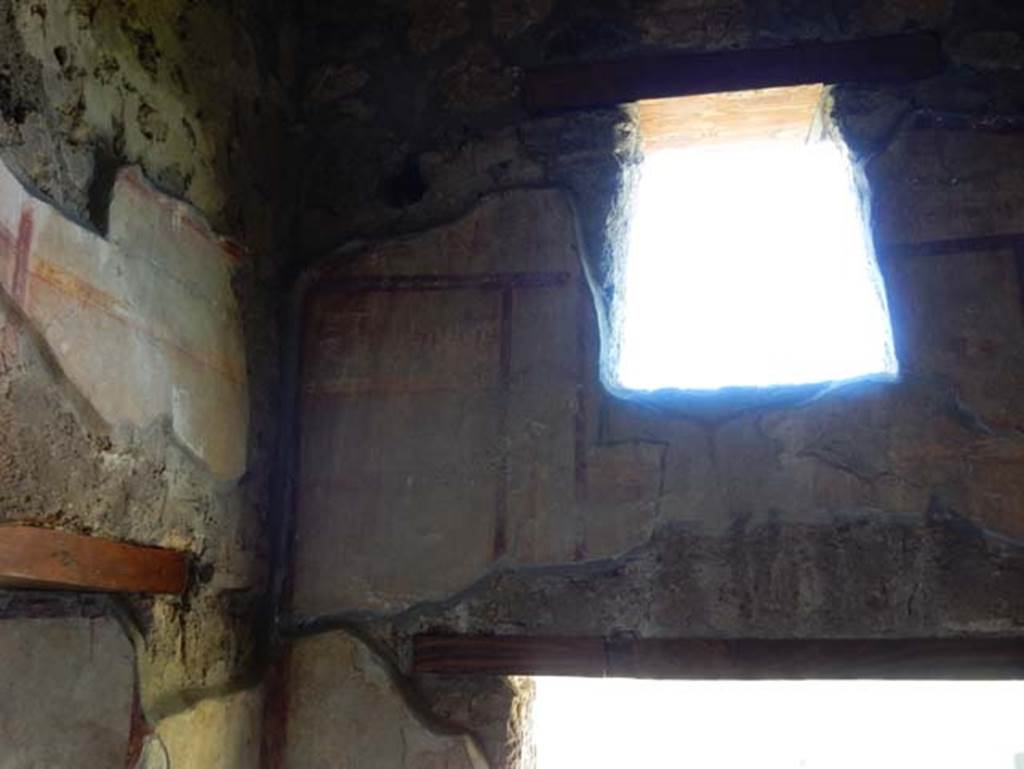 I.14.12, Pompeii. May 2018. Room 2, south-west corner, with doorway in south wall, and windows in west wall.
Photo courtesy of Buzz Ferebee