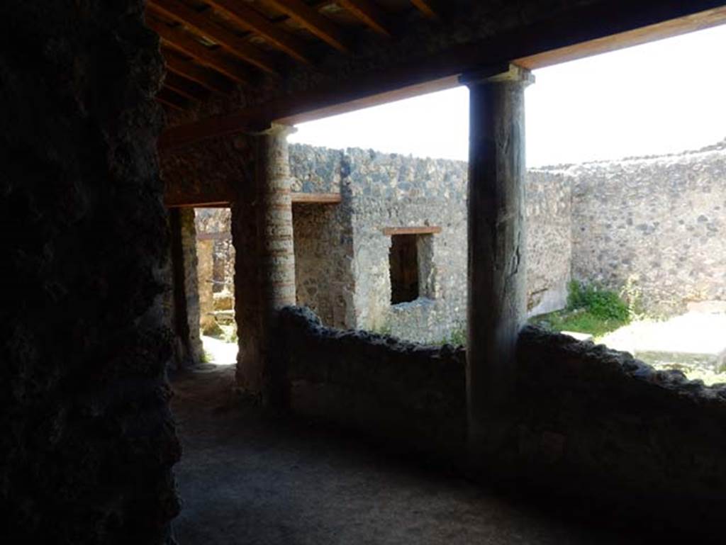 I.14.12, Pompeii. May 2018. Room 32, looking south-west across east portico towards window to room 3, overlooking peristyle. Photo courtesy of Buzz Ferebee
