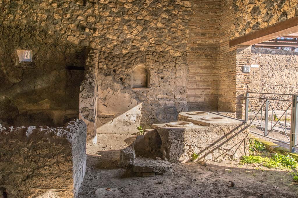 I.14.15 Pompeii. January 2019. Looking towards rear room, on left, and east side of bar-room, centre and right.
Photo courtesy of Johannes Eber.