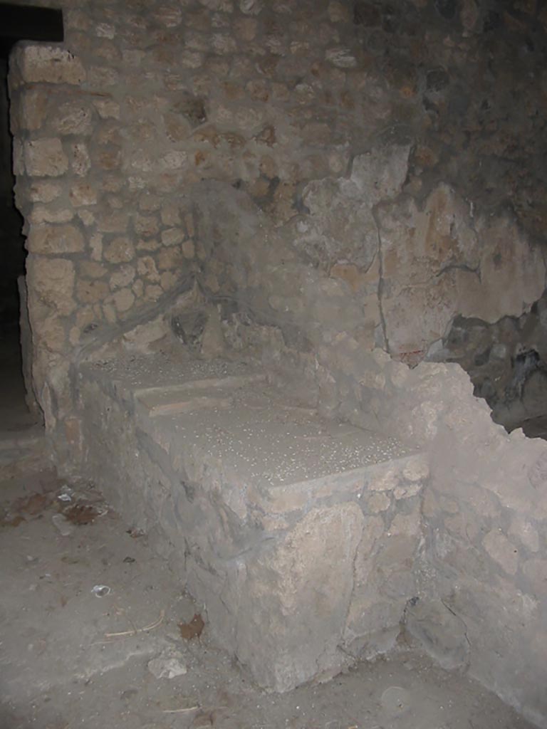 I.14.15 Pompeii. May 2003. 
Feature on east side of doorway to room on north side. Photo courtesy of Nicolas Monteix.